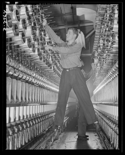 Fiberglass manufacture, Owens-Corning, Toledo, Ohio. Fiberglass yarns are twisted and plied on standard textile machinery as a step in the manufacture of tapes and cloths, used principally to insulate electric equipment operating under heavier loads today than ever before
