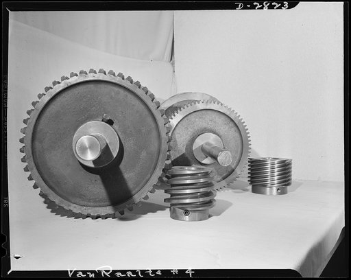 Conversion. Hosiery factory. This worm gear and worm wheel (left) once wove stockings for Miss America. Today they've been put to work for her Uncle Sam in the conversion of a large Eastern hosiery plant to production of mosquito netting for America's armed forces. Van Raalte Company