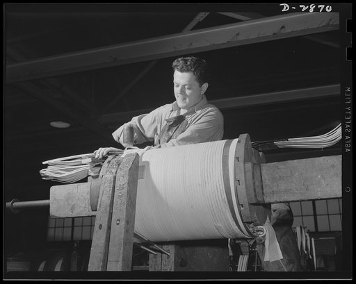 Transformer manufacture. It's a formidable task, but Jack Hassel can wind one of these asbestos insulated low volts coils in a day. Essential to America's war efforts, these asbestos coils are used in air cooled transformers which are explosion-proof, hence advantageous for use in ships, mines and l