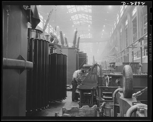 Transformer manufacture. These large transformers are being prepared for testing in a large Eastern plant given over almost entirely to the manufacture of transformers. Transformers are vital to almost every phase of war Production. Westinghouse, Sharon, Pennsylvania