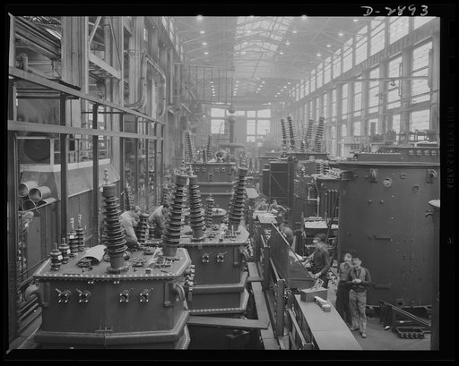Transformer manufacture. These large transformers are being prepared for testing in a large Eastern plant given over almost entirely to the manufacture of transformers. Transformers are vital to almost every phase of war production. Employed at the plant as electrical testers are nearly 200 graduate