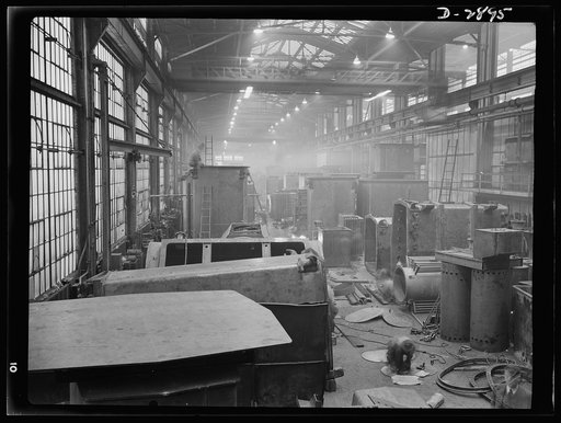 Transformer manufacture. Part of a large Eastern electrical plant where large transformer tanks are shaped and welded. Power transformers are an important part of America's war effort. Westinghouse, Sharon, Pennsylvania
