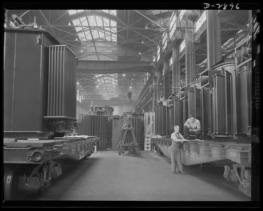 Transformer manufacture. These completed power transformers are sent to every part of the country and to almost every country in the Western hemisphere where they are needed in war production factories. These giants supply the power essentials to the production of ships and guns and tanks, as well a