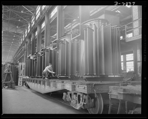 Transformer manufacture. These completed power transformers are sent to every part of the country and to almost every country in the Western hemisphere where they are needed in war production factories. These giants supply the power essentials to the production of ships and guns and tanks, as well a