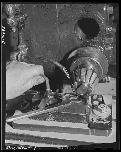 Conversion. Silverware plant. In times of peace this milling machine produced some of America's most beautiful silverware, but since December 1941 it has holder forceps, for use by surgeons of the nation's armed forces. Oneida Ltd., Oneida, New York