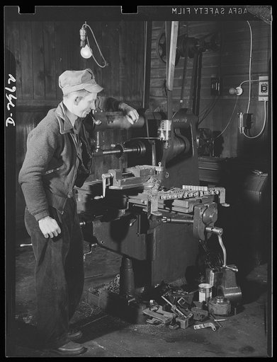 Subcontracting (Beery and Sons). A special jig on this milling machine at the shop of Beery and Sons meant a considerable cut in schedule on a small part ordered by a war subcontractor. If repeat orders for this part come, the time will be cut to one- eighth of the original schedule