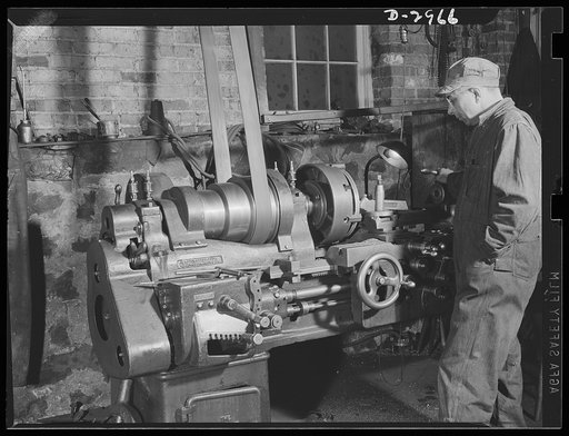 Subcontracting (Wilbarger and Sons). Workers at the shop of Wilbarger and Sons, Harrisonburg, Virginia, are doing away with the overhead belt system of operating their machines. Delays are too frequent and they will not brook delays in war production. The machines are being converted to direct gear 