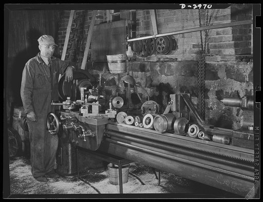Subcontracting (Wilbarger and Sons). These are special jigs and chucks designed and made at Wilbarger and Sons Shop, Harrisonburg, Virginia, for special war production jobs. The workers in many thousands of little shops such as this are using all their ingenuity to do what they can to speed the job 