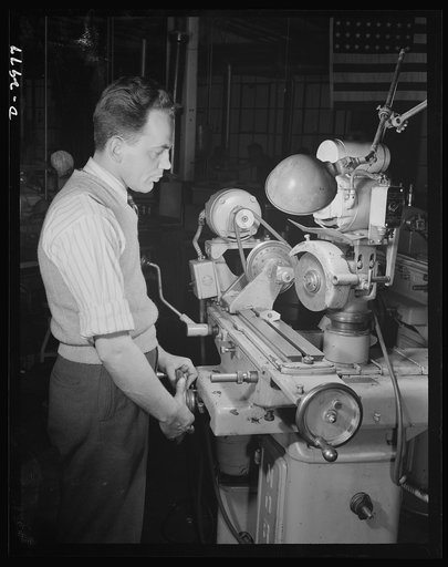 This Norton cutter-grinder which had been specially adapted to grind cams on the motor shaft for the electric dry shaver which this New England plant normally produces, has now been converted to grind permanent magnet rotors for machine tool motors. The conversion was accomplished with new jigs and 