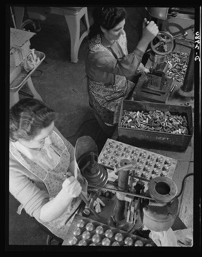 Conversion. Electric shaver plant. Before and after! This New England plant, whose normal product is electric dry shavers, now is converting to the production of machine tool parts to speed war production. At the right the worker is drilling pressure pinholes in the heads of the shavers; at the left