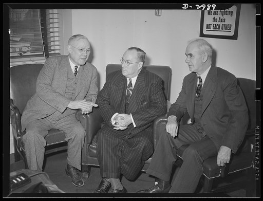 Washington, D.C., March 7, 1942. Donald Nelson, Chairman of the War Production Board meets with the nation's leaders to discuss plans for the production drive. Left to right: William Green, President of the AFL (American Federation of Labor); Donald Nelson, Chairman of the War Production Board; Phil