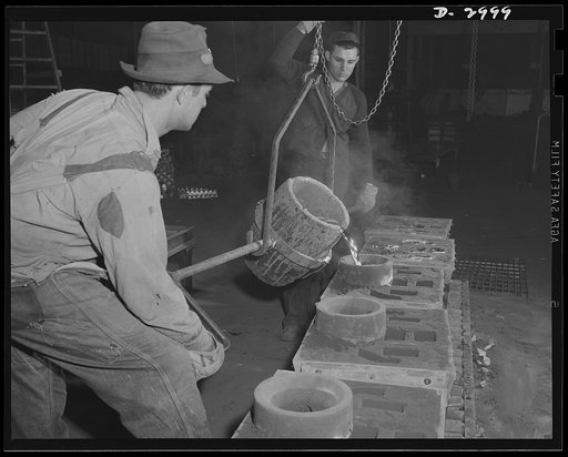 Aluminum casting. Experienced workers in an aluminum plant, converted to production of essential articles for America's armed forces, pictured pouring the molten aluminum alloy into molds. Aluminum Industries Inc., Cincinnati, Ohio
