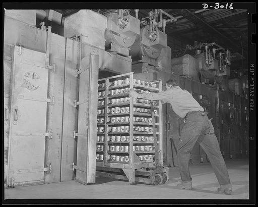 Aluminum casting. Shelf after shelf of aluminum castings on their way to the heat treating oven for low temperature precipitation treatment. These castings are for aluminum piston heads. Aluminum Industries Inc., Cincinnati, Ohio