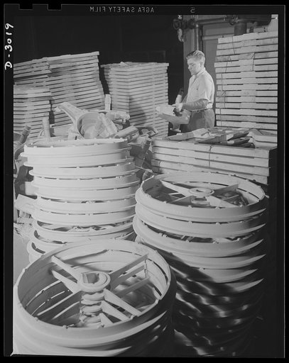 Aluminum casting. Stock room in the shipping department of a large Midwest aluminum factory. Completed rings may be destined for use by Uncle Sam's armed forces--somewhere in the field. Exact use and destination of these articles has been kept secret. Aluminum Industries Inc., Cincinnati, Ohio