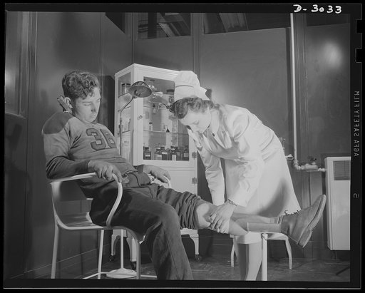 Aluminum casting. First aid right on the spot. A nurse is in constant attendance in this Midwest aluminum foundry to treat minor cuts and wounds received in production of aluminum and magnesium molds and casting. Aluminum Industries Inc., Cincinnati, Ohio