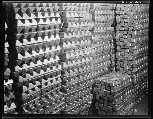 Aluminum casting. Storage room in a large Midwest aluminum plant where certified aluminum ingots or "pigs" are stacked. These will shortly become essential parts of the Army's mechanized equipment. Aluminum Industries Inc., Cincinnati, Ohio