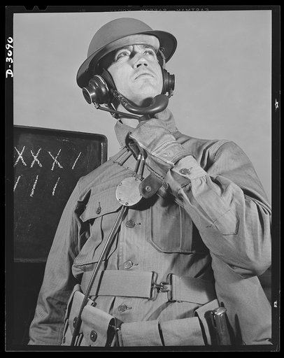Fort Story coast defense. Target practice at Fort Story, Virginia. This soldier analyzes hits and misses at the control post of one of Uncle Sam's coast artillery batteries..