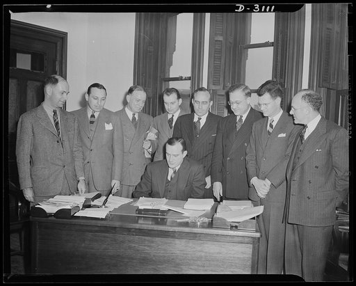 War Production Board Sugar Policy Committee. This shows the first meeting of the newly formed War Production Board Sugar Policy Committee. The committee consists of representatives of light government agencies concerned with the sugar problem. The committee was formed to exchange information and to 