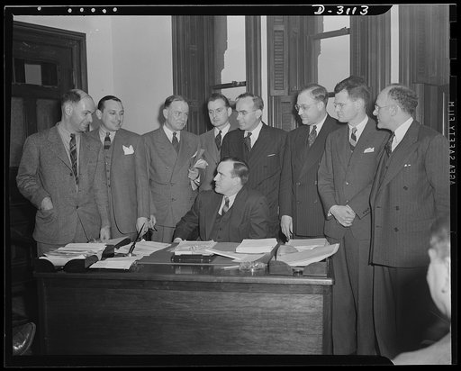 War Production Board Sugar Policy Committee. This shows the first meeting of the newly formed War Production Board Sugar Policy Committee. The committee consists of representatives of light government agencies concerned with the sugar problem. The committee was formed to exchange information and to 
