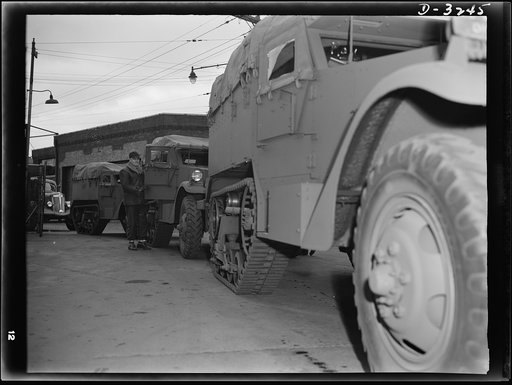 Army halftrac scout cars ready for final test. When the test drivers of a large Midwest plant get through doing their stuff, these trucks will be ready for full Army duty. White Motor Company, Cleveland, Ohio