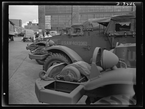 Halftrac scout cars ready for the Army except for the addition of certain pieces of Army equipment. The cars as they stand in the yard of a Midwest manufacturer are ready for combat duty. White Motor Company, Cleveland, Ohio