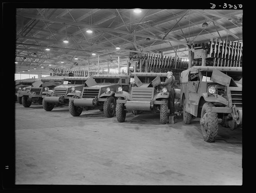 New recruits for America's armies. Halftrac scout cars ready for delivery from the Midwest plant at which they were made. White Motor Company, Cleveland, Ohio