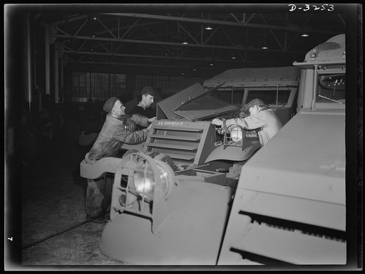 Careful plant inspections assure that each new Army scout car is correct in every detail before it leaves the production line of a large Midwest truck plant. White Motor Company, Cleveland, Ohio