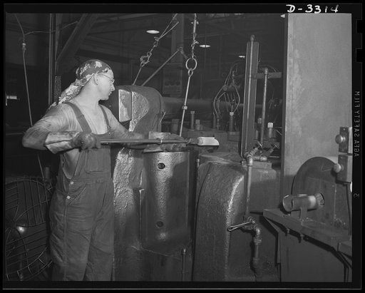 The forging of a shell for the Army involves operations that skilled men, working with highly developed power equipment, take in stride. Both men and machines were quickly converted from peacetime workers in an automobile plant to wartime producers for America's arsenal of democracy. Oldsmobile, Lan