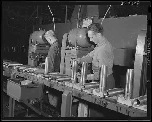 Each shell must have proper identification as it travels along the production line. This operation imposes no undue burden on the trained workers of a converted automobile plant where the shells are being made. Oldsmobile, Lansing, Michigan