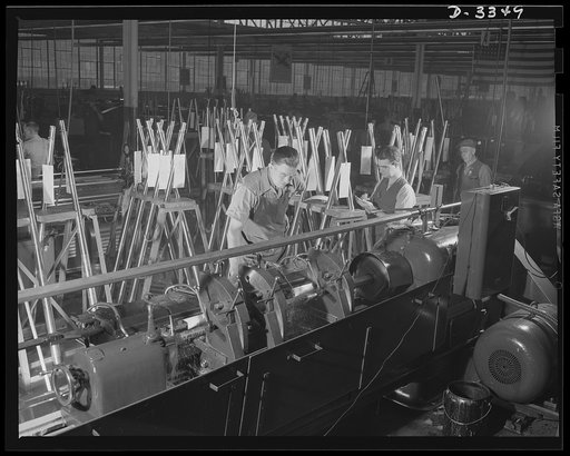 Twenty-millimeter machine guns for planes. Just as the "long rifle" of the American pioneer was the world's best gun of its day, so the machine guns of our modern air force must be better than any other. Shaping a machine gun barrel is exacting work, but the precision techniques of a former auto pla