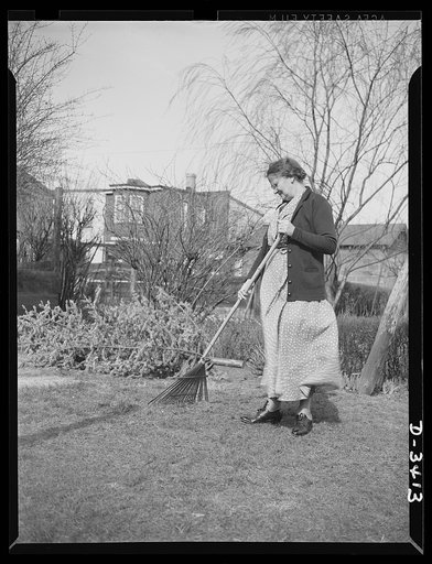 Women at war (Mrs. Smuda). Although she spends eight hours a day preparing ammunition for America's fighting forces, Eva Smuda has plenty of energy left after work to keep the lawn in shape