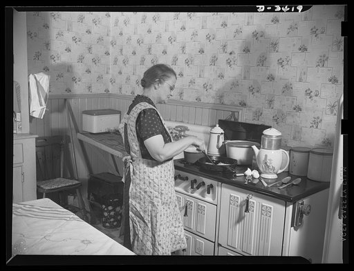 Women at war (Mrs. Smuda). Although she's one of America's vital production workers eight hours each day, fifty-five-year-old Eva Smuda still finds plenty of time to devote to home and family. Before the rest of the household is up, she has breakfast on the stove