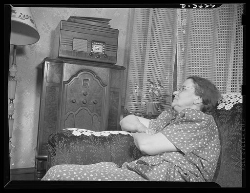 Women at war (Mrs. Smuda). She's a mother and a grandmother, she works at a U.S. arsenal tapering shells for fifty-millimeter anti-aircraft guns and she loves listening to news broadcasts and Bing Crosby. Eva Smuda, fifty-five, who came to America from Poland at the age of three, has one son in the 