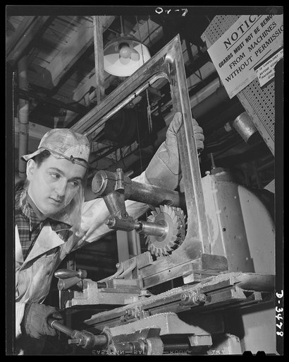 Conversion. Metal screens to bomber windows. Milling fillets on passenger train window frames in the plant of an Eastern manufacturer of metal door and window