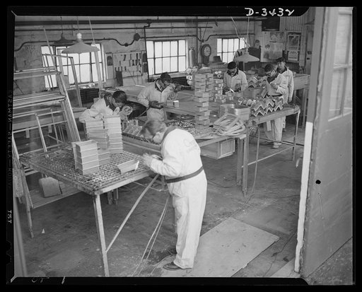 Conversion. Metal screens to bomber windows. Aluminum parts for the Air Corps are welded at an Eastern plant that used to make metal screens for windows and doors. Among the items now produced are junction boxes, switch boxes for airplane tow targets and navigator windows for bombers