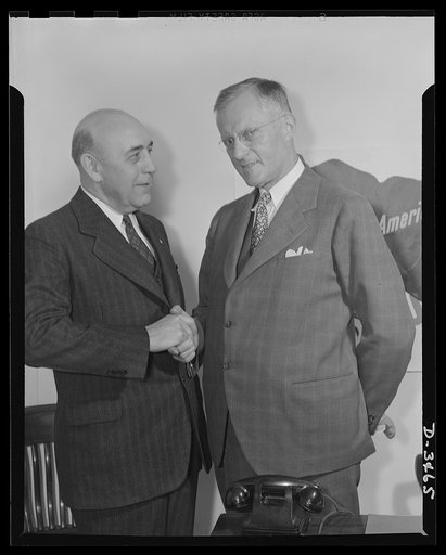James B. Harvey, recently appointed Director for Priorities for the Western area, greets Andrew L. Kerr, District Priorities Manager with headquarters at San Francisco, California