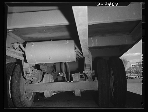 New oversize trailer for war workers. Note modern floating axle on the new oversize bus trailer which holds 141 persons and may be the answer to the problem of transporting war workers to outlying defense plants. Designed and built by Office of Defense Transportation and War Production Board (WPB) o