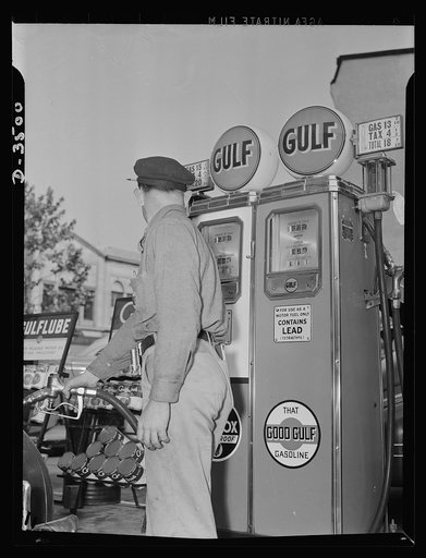 Every citizen can get his share. Our democratic way of sharing the limited amount of gasoline means a new stance for the service station attendant. He keeps an eye on the guage instead of on the tank. Every man gets what is coming to him--no more
