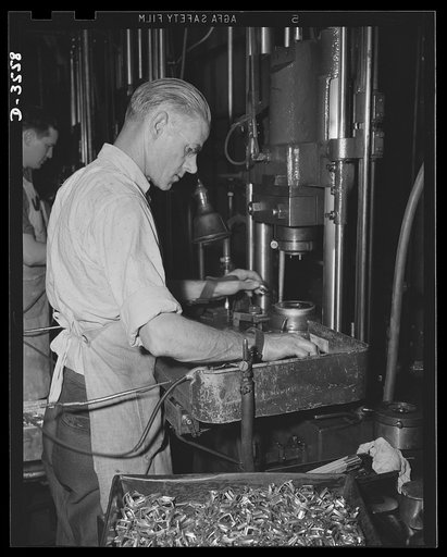 Conversion. Watch cases to war production. Volume for victory. His skill in the making of luxury items is an asset for a Kentucky watch case factory now producing compass cases, fuse baffles, gun parts and other war essentials. Wadsworth Watch Company, Louisville, Kentucky