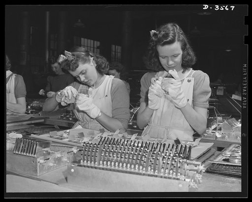 Conversion. Watch cases to war production. They'll be doing war work soon. When the last batch of ladies' compacts is cleaned at a converted Kentucky plant, these girls will use their skill in the prduction of bomb fuse baffles, compass cases and parts for carbine and machine guns. Wadsworth Watch C