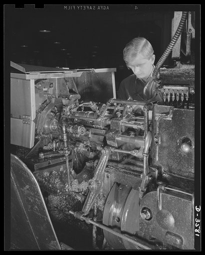 Production of 20mm fuses is speeded by a multiple spindle automatic screw machine in a converted cash register factory. National Cash Register Company, Dayton, Ohio