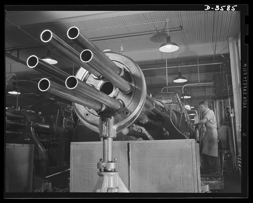 Conversion. Cash registers to gun magazines. "The Gattling gun of the production line." That's what the workers of a converted cash register plant call this multiple spindle automatic screw machine which performs important operations on M-48 shell bodies. National Cash Register Company, Dayton, Ohio