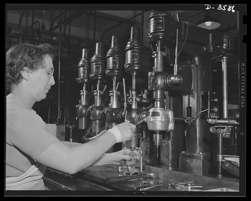 Conversion. Cash registers to gun magazines. A multiple drill press operation in the making of Oerliken magazines for 20mm anti-aircraft guns. The converted cash register manufacturing plant doing the work adapted many of its regular workers and machines to the new job. National Cash Register Compan