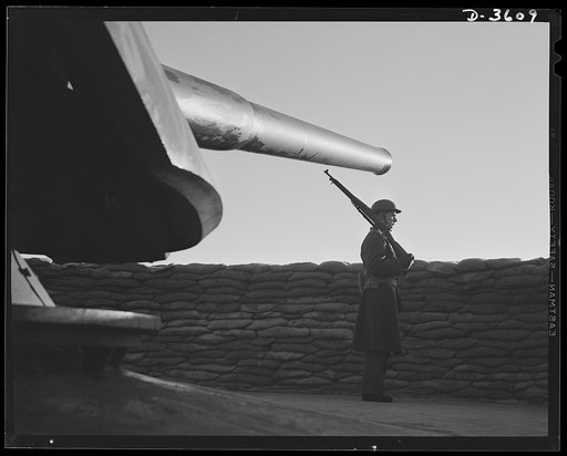 Fort Story coast defense. Guardians of the Atlantic seaboard. Sentry and shore gun at Fort Story, Virginia