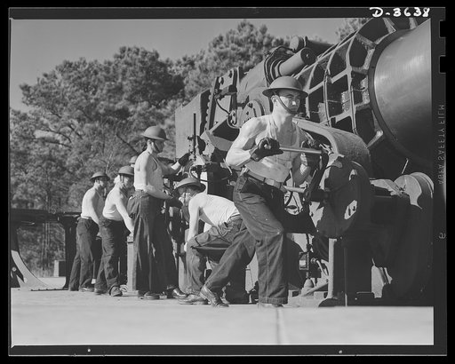 Fort Story coast defense. Maneuvers at Fort Story, Virginia. It takes plenty of muscle power to track the target with the gun