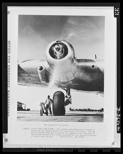 Rubber keeps them flying. This bomber needs thousands of pounds of rubber for the landing wheels and bullet-proof fuel tanks. The flyers and ground crews can do none of the important work entrusted to them unless we keep their planes supplied with the prodigious amounts of rubber they require