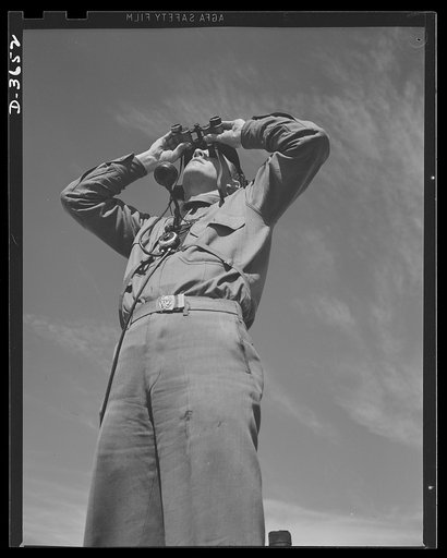 Fort Story cosat defense. Searching the sky for planes. Note the detector apparatus on his chest