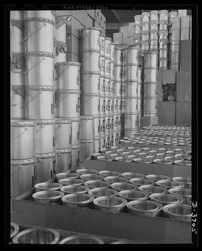 Aluminum paint is a civilian scarcity these days, but Uncle Sam still uses lots of it. These one and five gallon containers are ready to be filled in a large Midwest aluminum factory now producing army essentials under army contract. Aluminum Industries