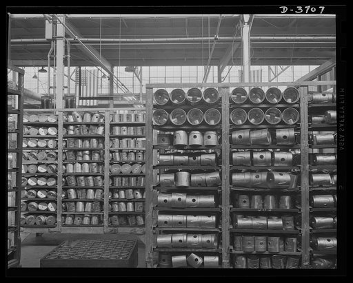 Aluminum castings. Aluminum castings stacked on trucks in a large Midwest aluminum foundry now converted to production of articles for the army and air corps. These cylinders are now ready for heat treatment