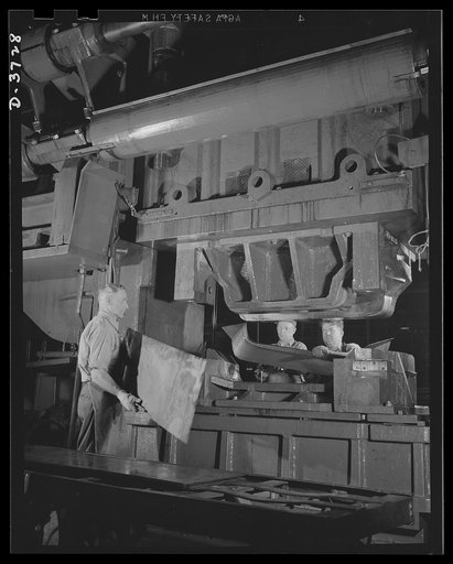 Striking telling blows at the Axis. Each blow of this machine stamps out a cowl for an army jeep from a flat steel sheet under 350 tons prssure. The 126-ton Bliss double-action press is regular equipment of one of the world's largest automobile plants. Ford Lincoln plant, Michigan